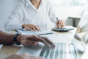 Business owners reviewing enquiry figures after website traffic down