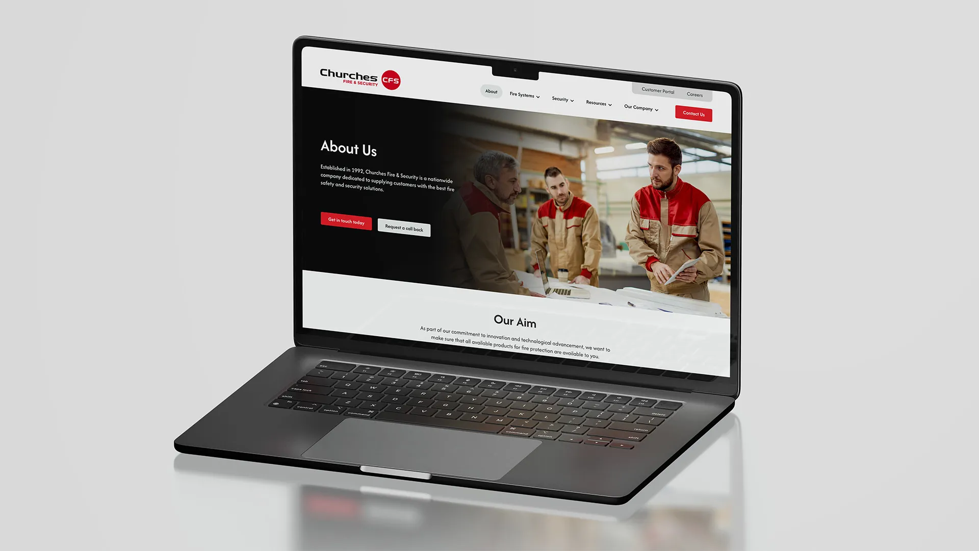 Churches Fire & Security's new website on a laptop
